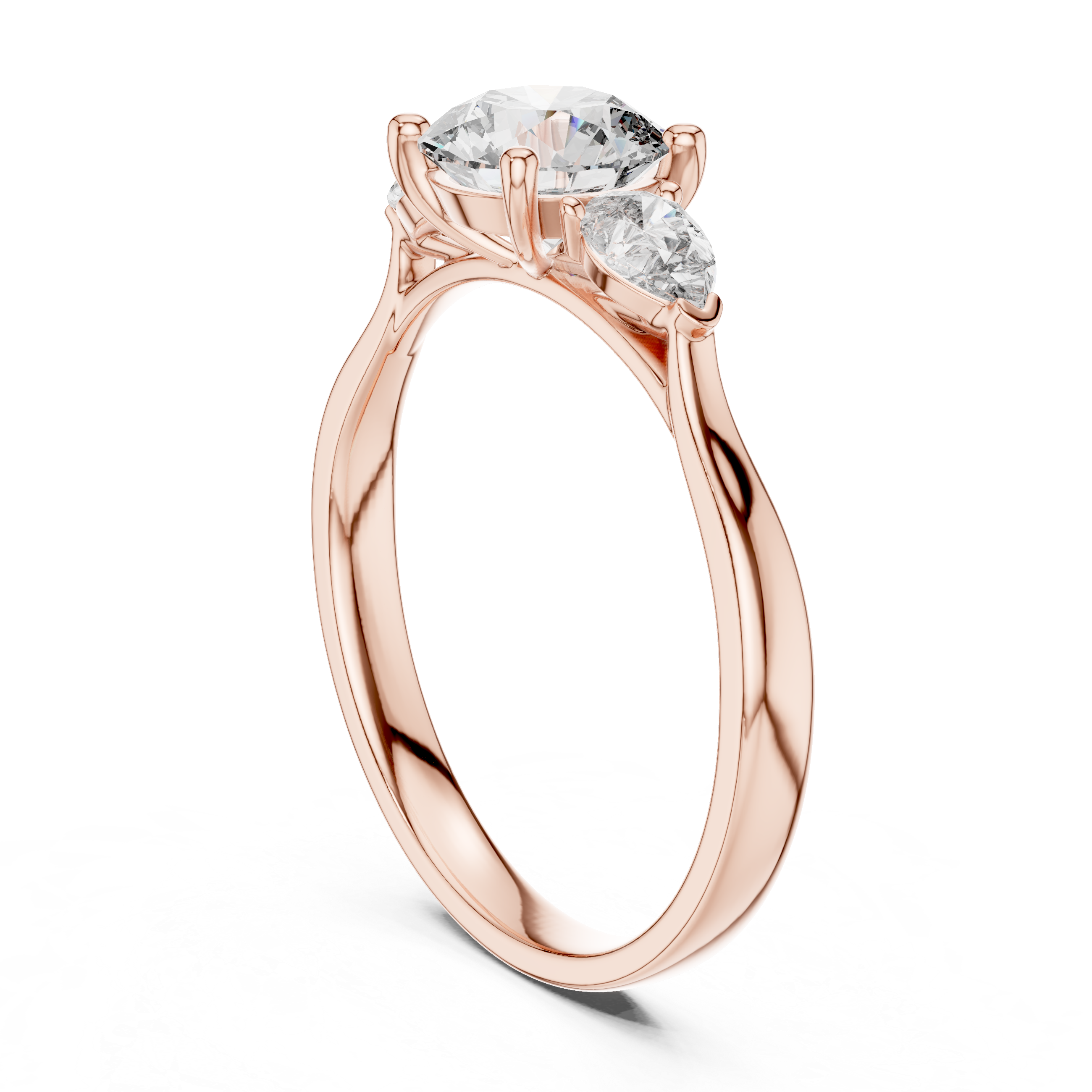 Round and Pear Diamond Three Stone Ring