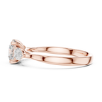 Round and Pear Diamond Three Stone Ring