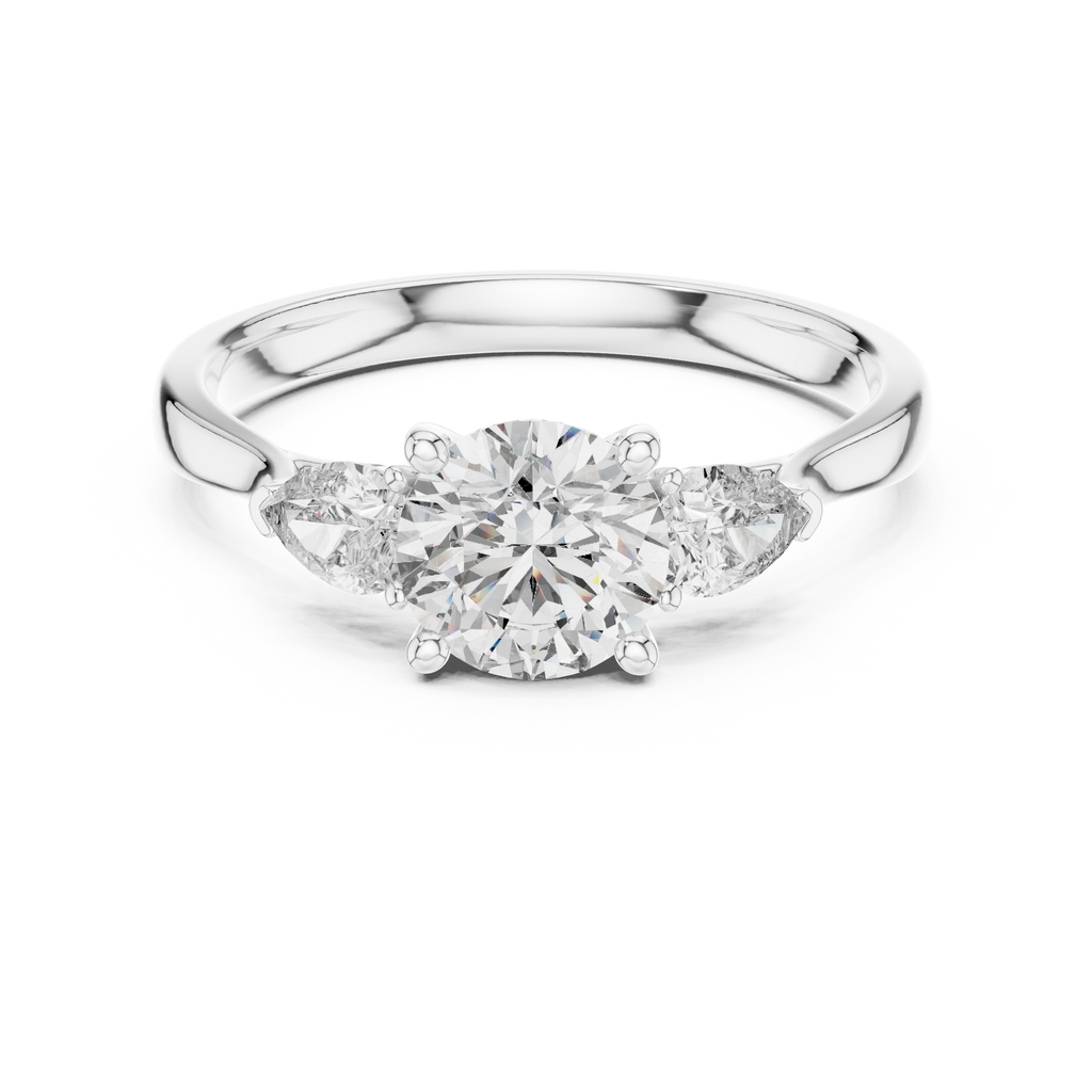 Round and Pear Diamond Three Stone Ring
