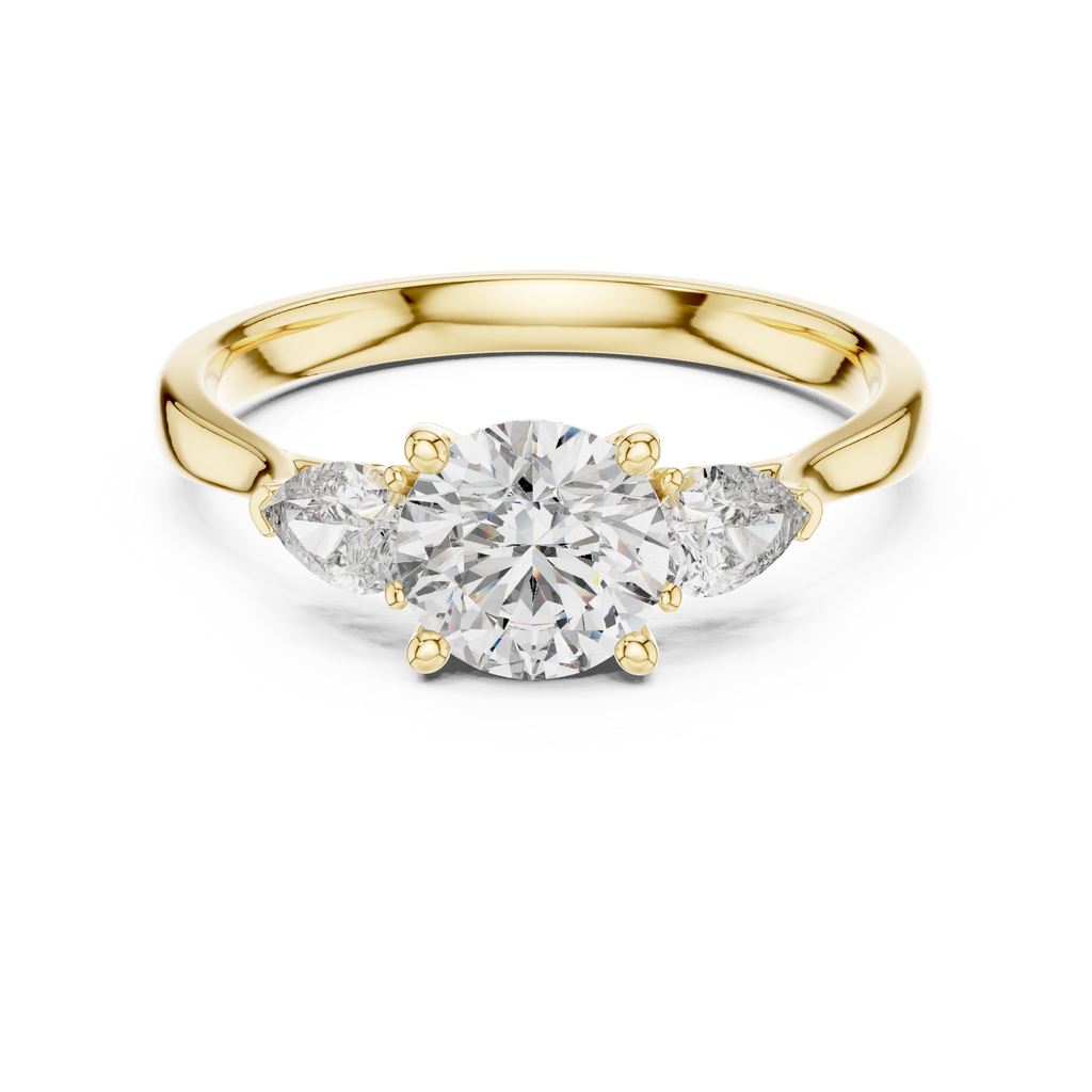 Round and Pear Diamond Three Stone Ring