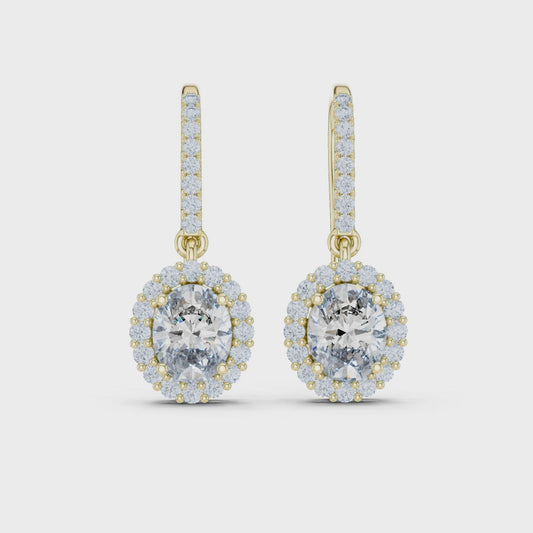 Modern Hook Earrings With Oval Cut Diamond