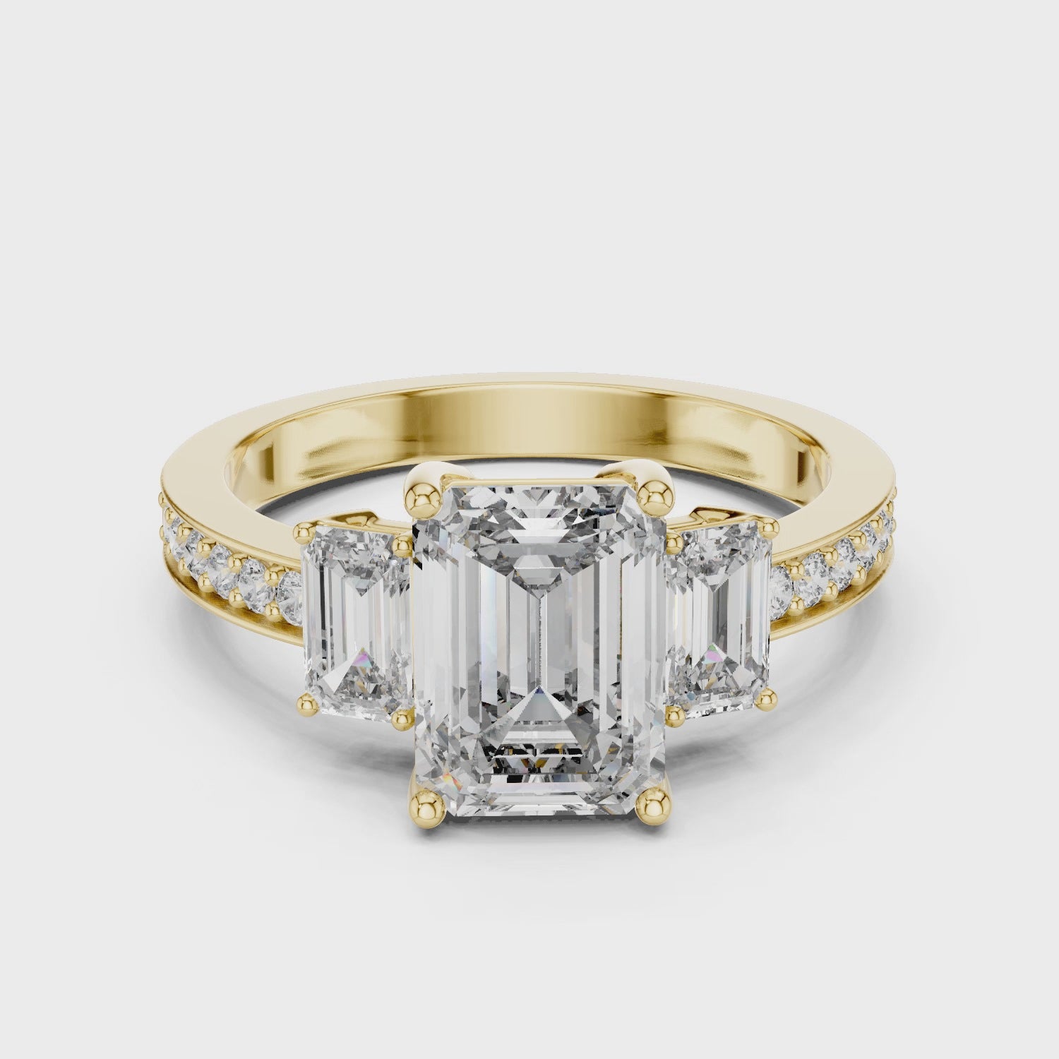 Emerald Cut Three Stone Engagement Ring