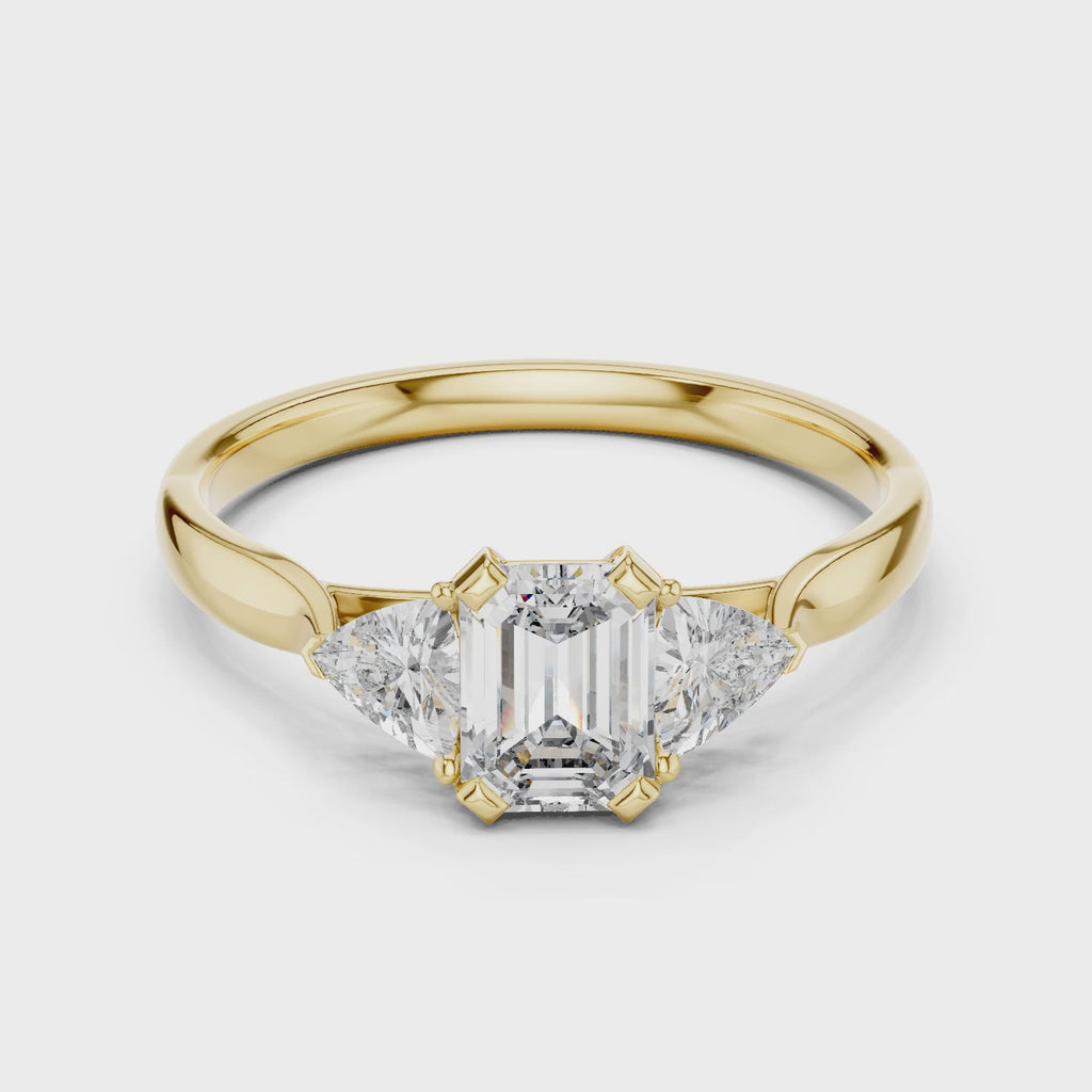 Emerald And Trillion Cut Three stone Ring