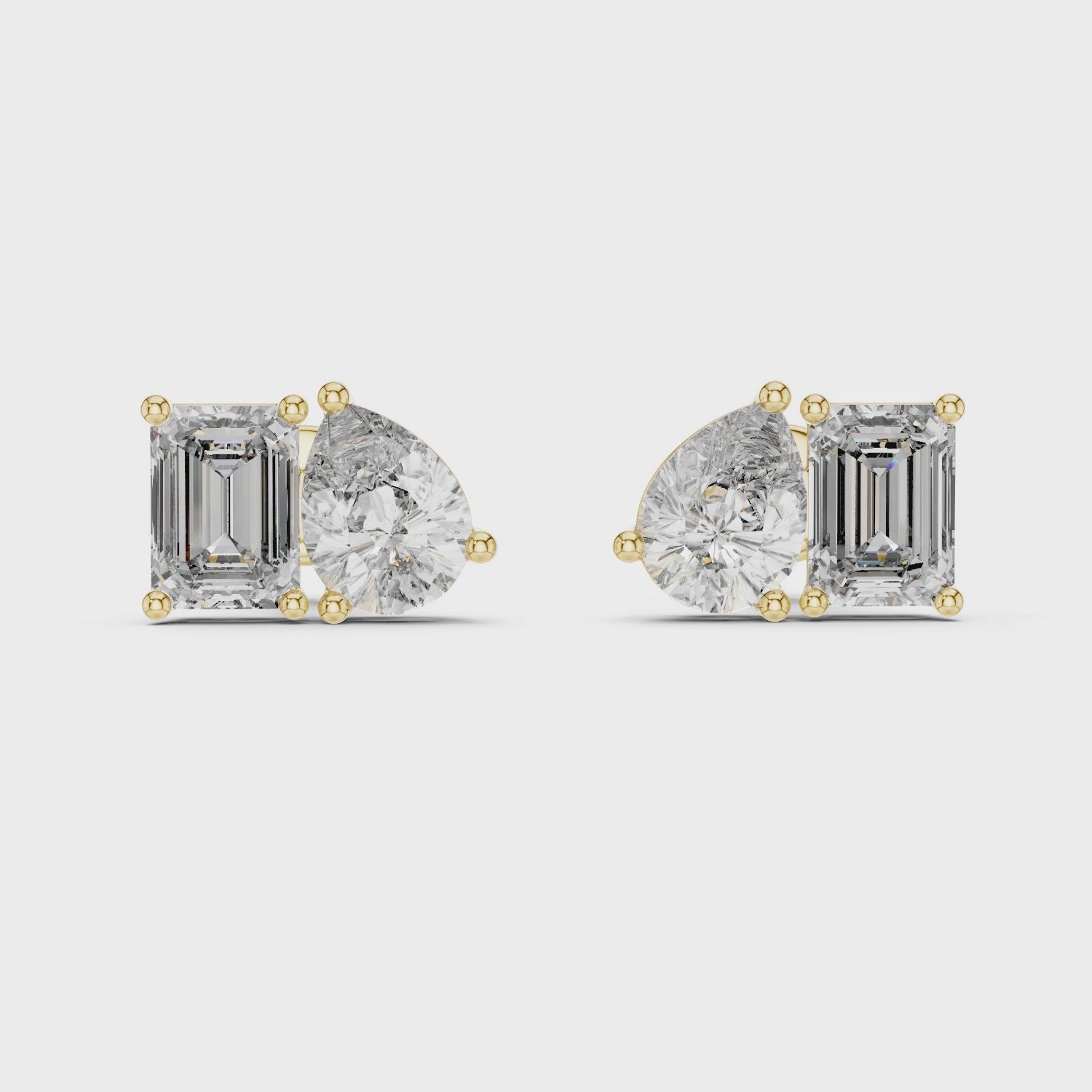 Emerald And Pear Cut Diamond Stud Earrings